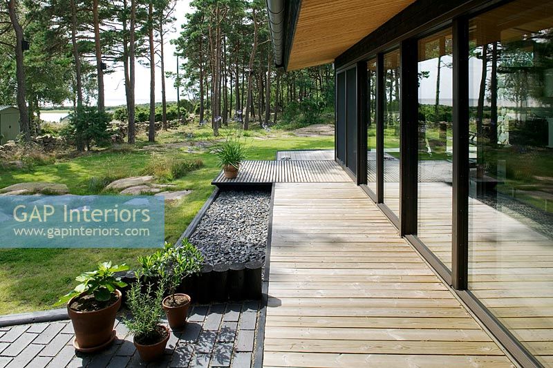 Modern detached home exterior with decking