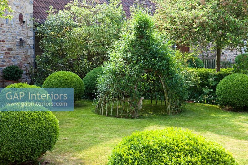 Country garden with topiary