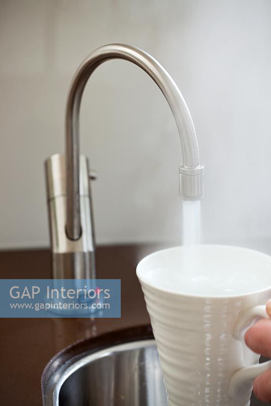 Person using hot tap