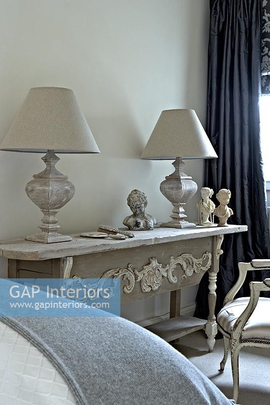 Ornate console table with stone top