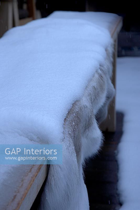 Snow covered fur seat cover, detail