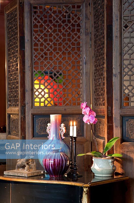 Oriental wooden screen and table, detail