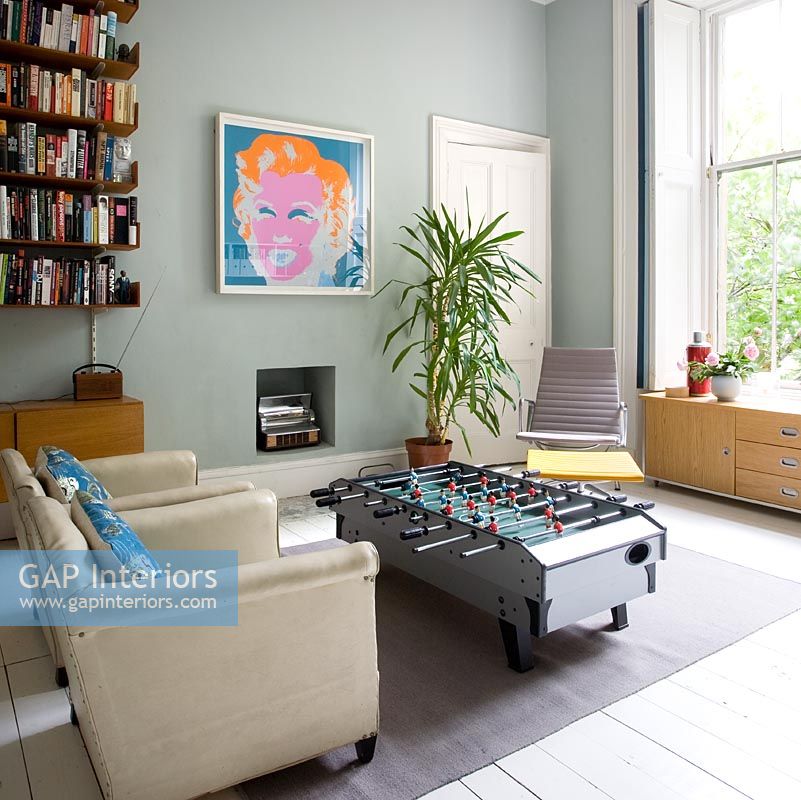 Modern games room with retro furniture 