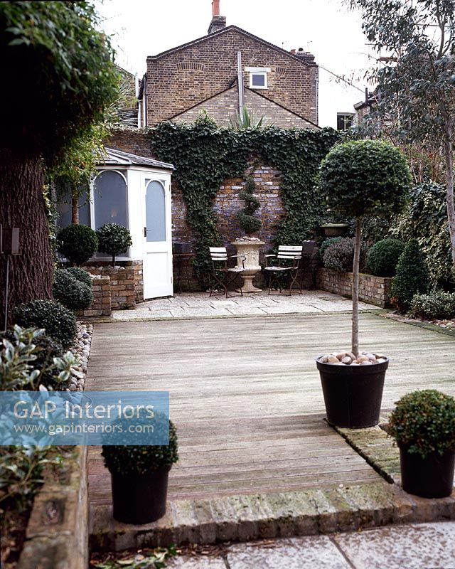 Classic garden with topiary in pots