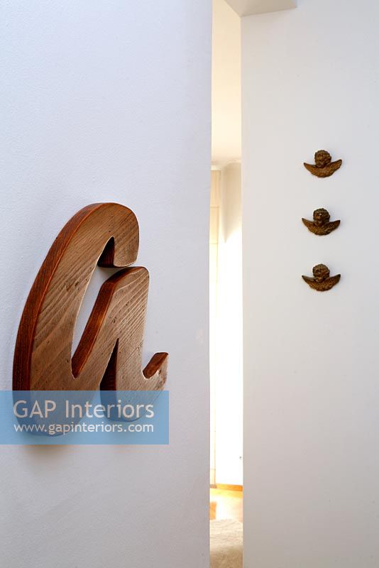 Giant wooden lettering on wall
