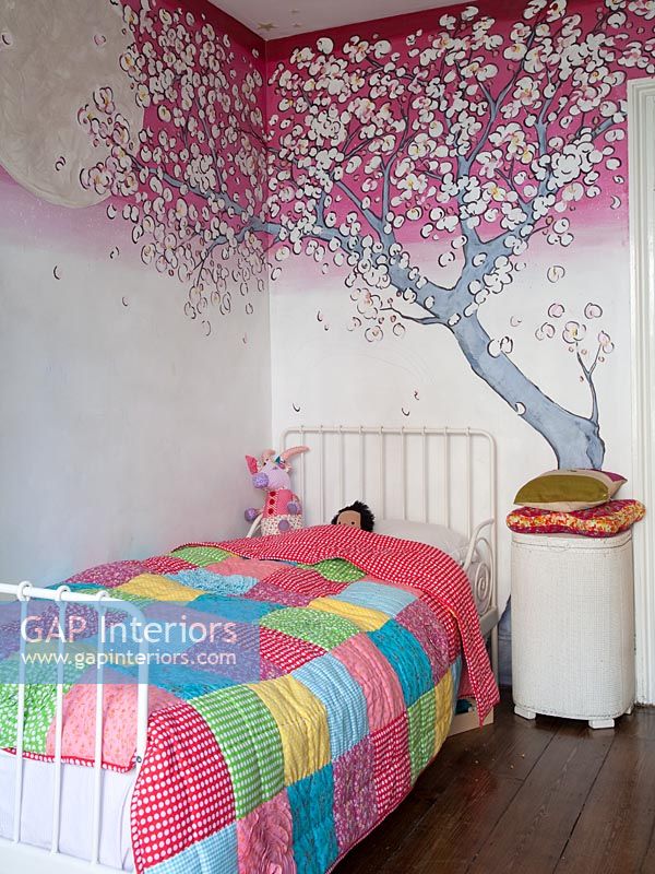 Childs bedroom with colourful mural