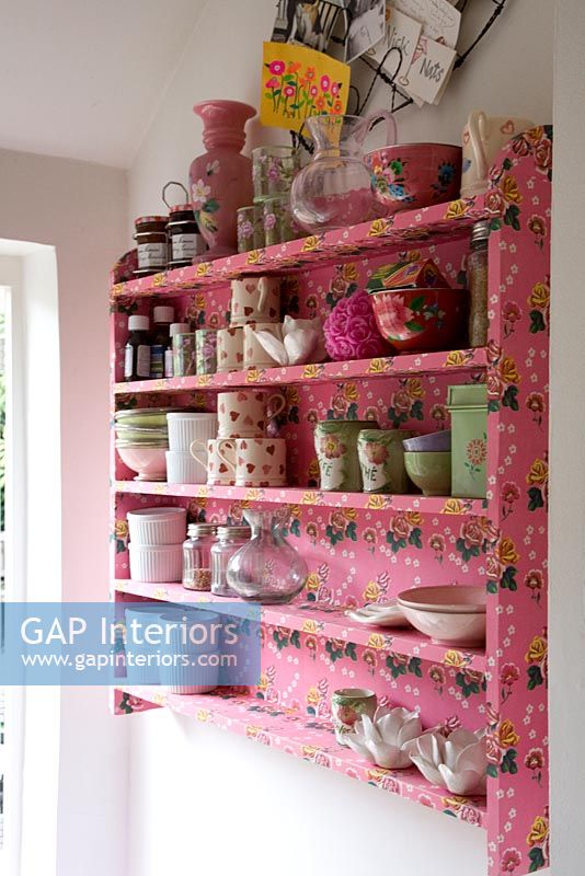 Floral pink shelves in kitchen