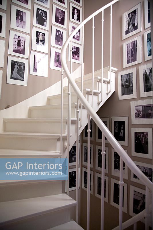 Display of photographs on ornamental staircase