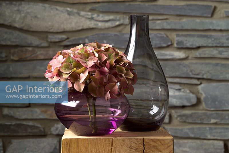 Hydrangea in grey glass vase