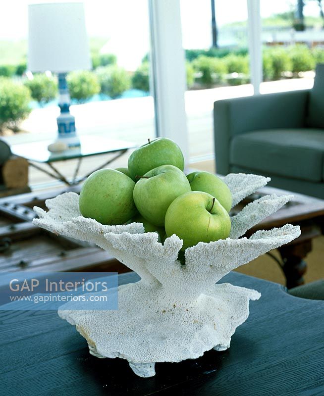 Coral bowl and apples