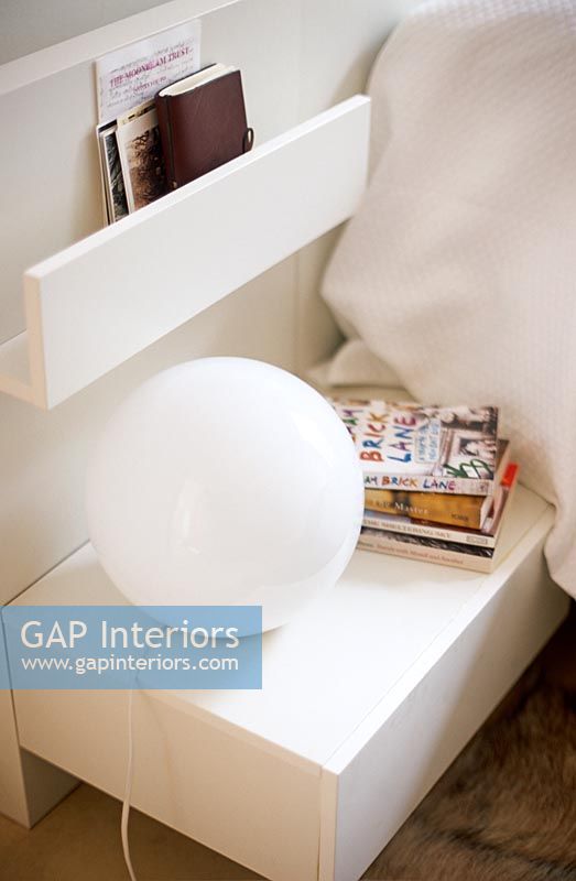 Spherical lamp on built in bedside table
