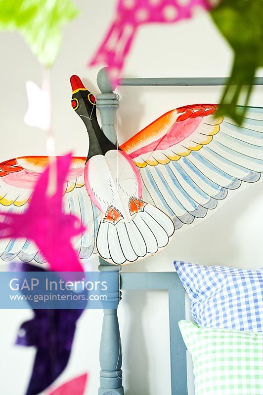Detail of bird mobile in childrens room 