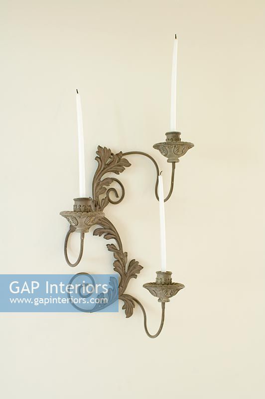 Ornate wall mounted candle holder