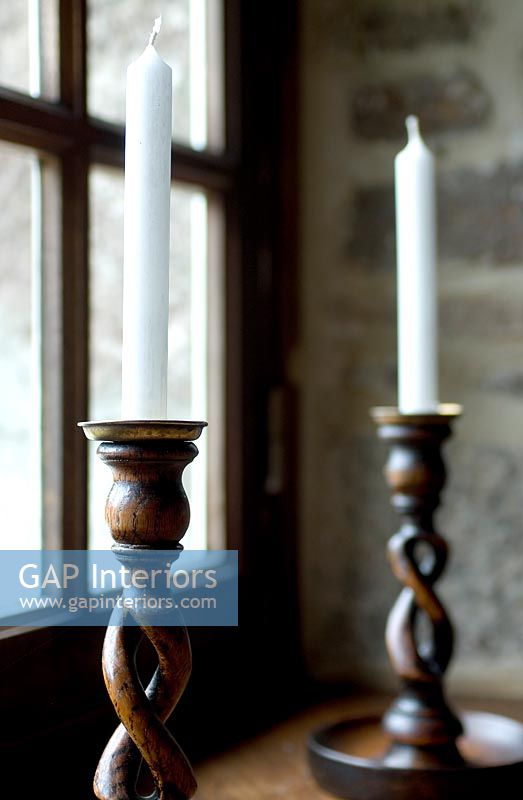Pair of twisted wooden candlesticks 