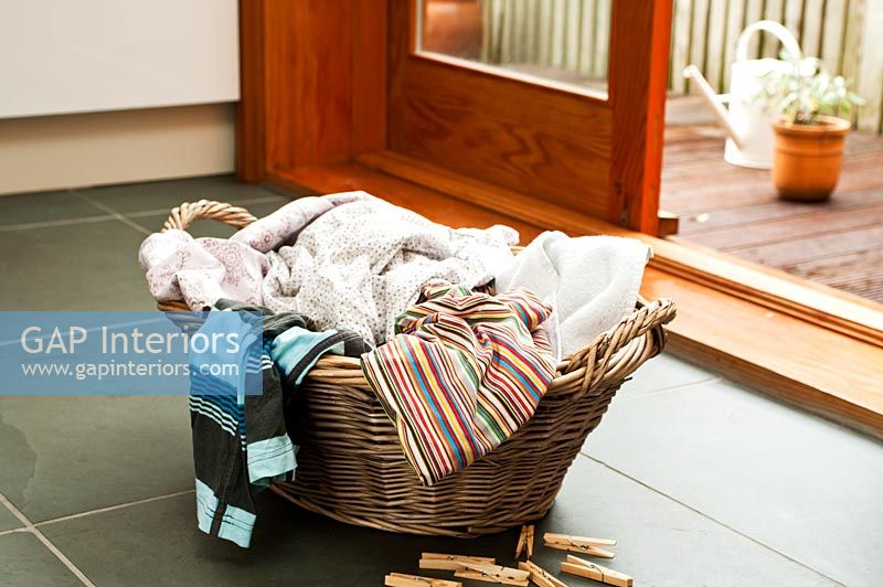 Clothes in linen basket 