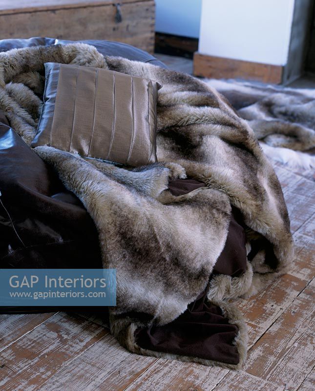 Fur blanket and cushion detail 