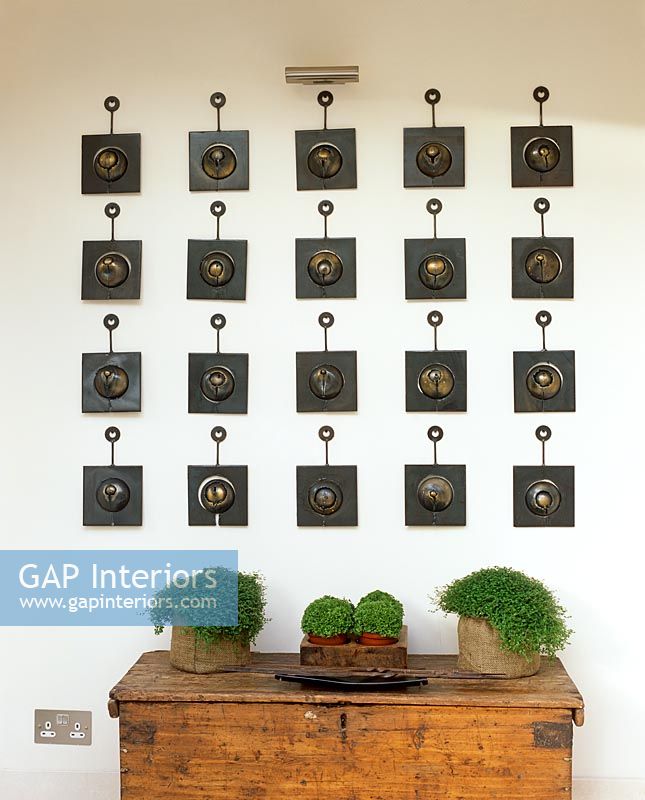 Display of brass wall hangings 