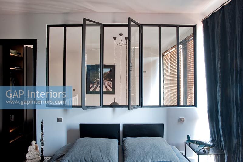 Windows in modern bedroom 