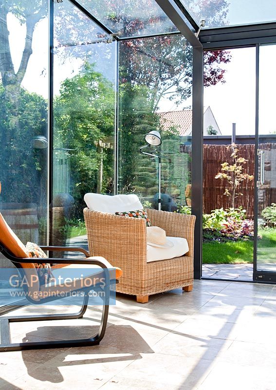Chairs in modern conservatory  