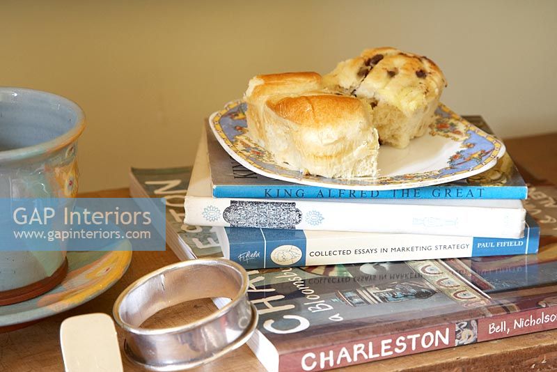 Detail of scones and books on table 