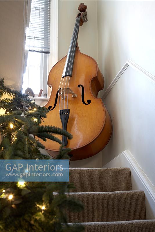 Cello at the top of staircase 