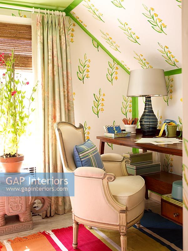 Country study with patterned wallpaper 
