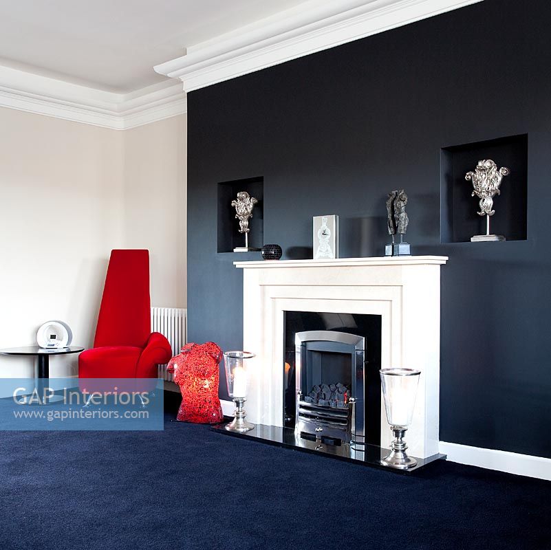 Modern living room with black feature wall