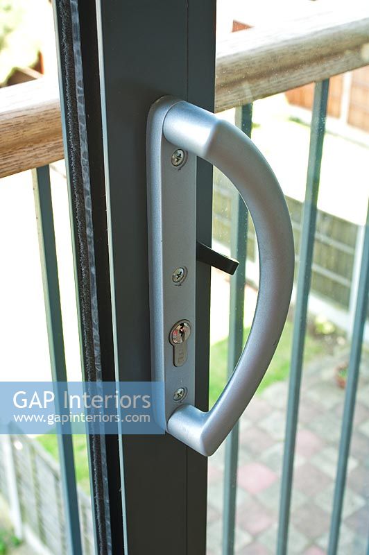 Handle and lock of sliding patio door 