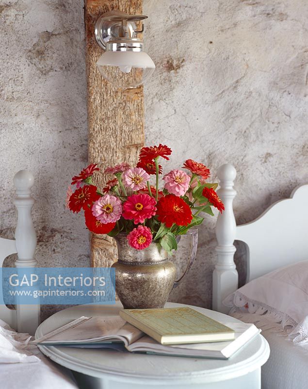 Flowers on country bedside table 