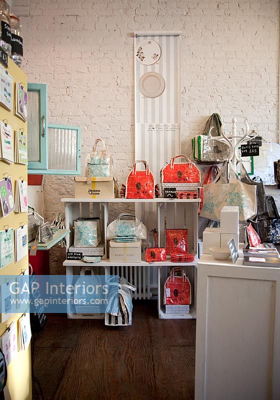 Bags and accessories on display in shop 