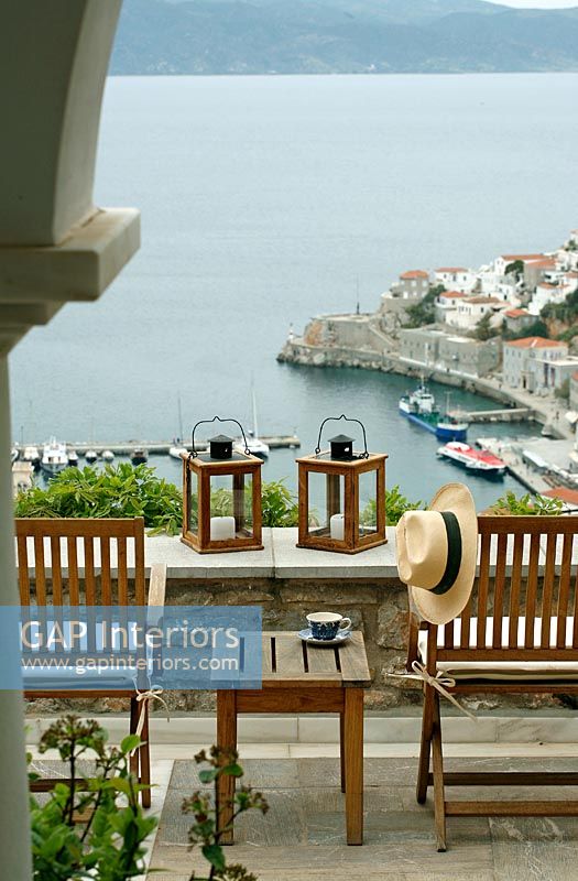 Garden furniture on terrace with harbour views 