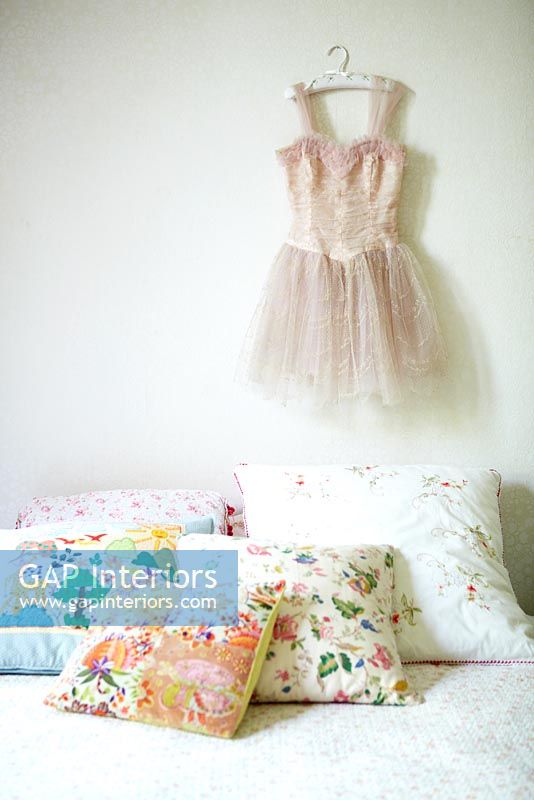 Childrens dress on bedroom wall 