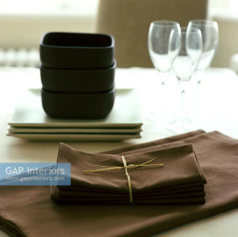 Detail of serviettes on modern dining table 