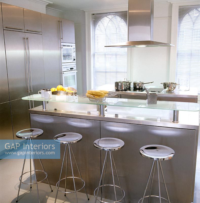 Modern kitchen with glass breakfast bar