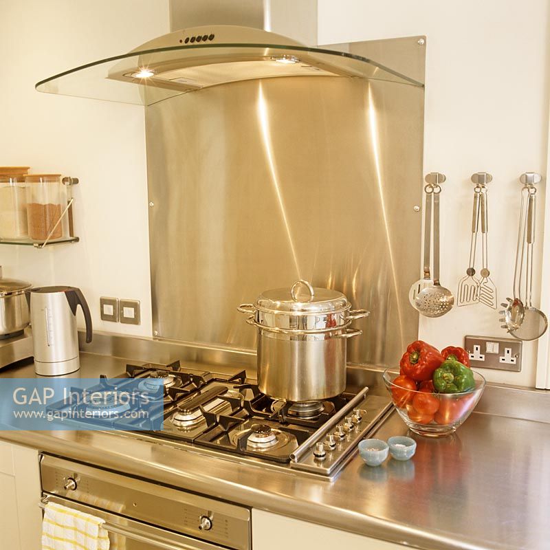 Modern stainless steel cooker and extractor fan