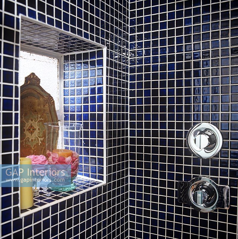 Modern shower with navy mosaic tiles 