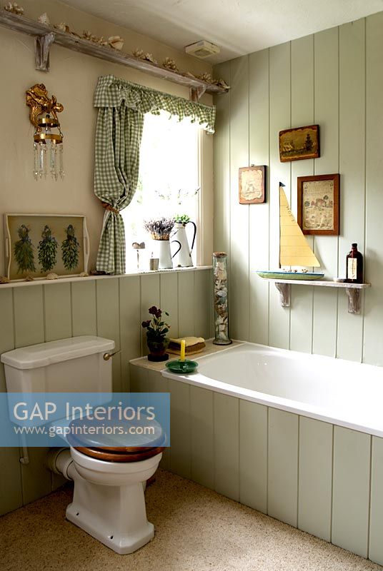 Country bathroom with paneled walls 