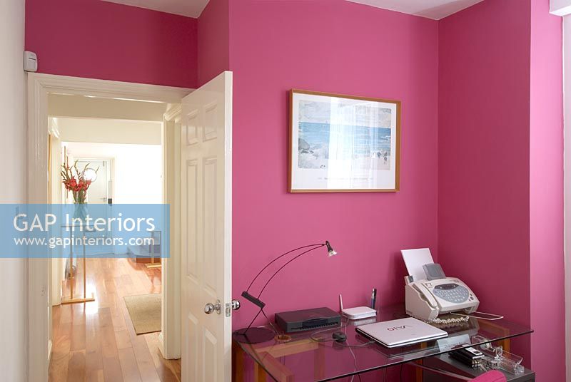 Modern study with pink walls 