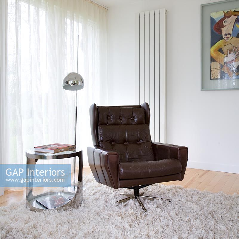 Vintage leather armchair and side table 