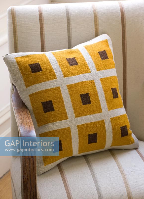 Patterned cushion on chair 