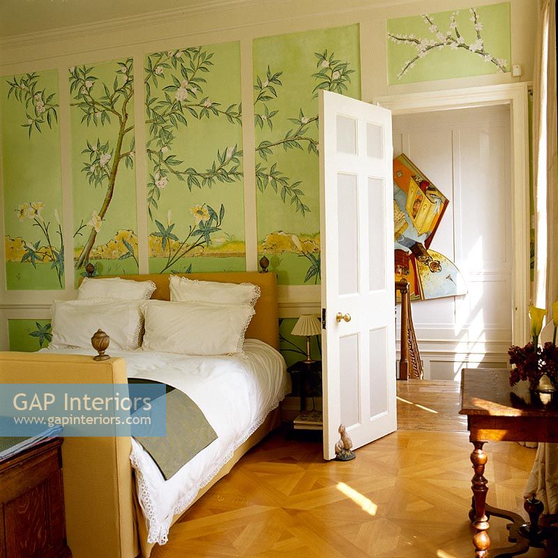 Classic bedroom with decorative wall paper 