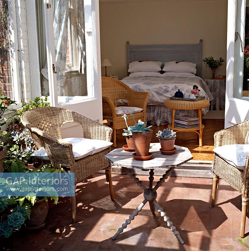 Garden furniture on terrace outside bedroom 