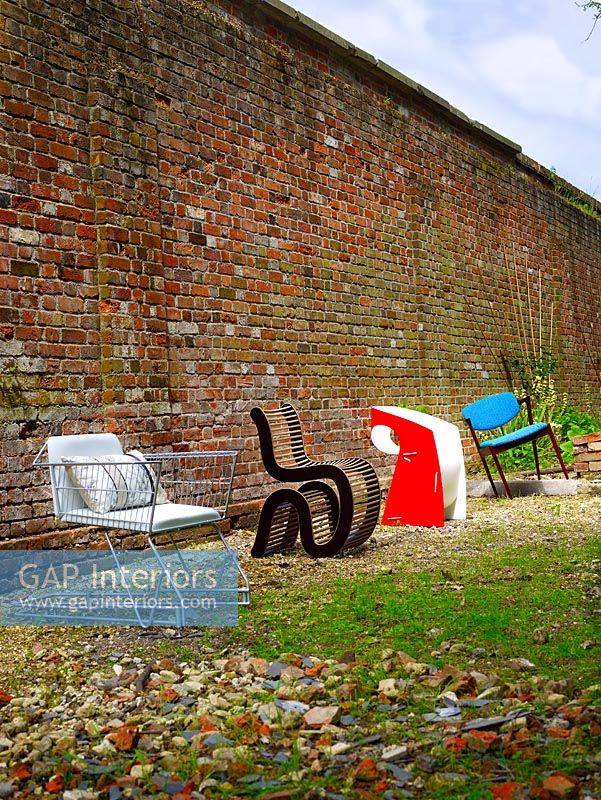 Chairs in front of wall