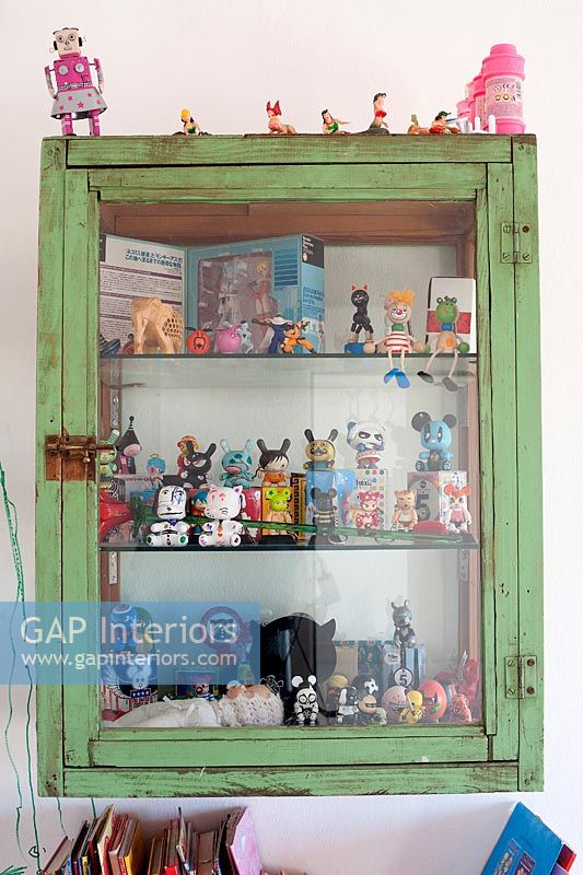 Toys in display cabinet 