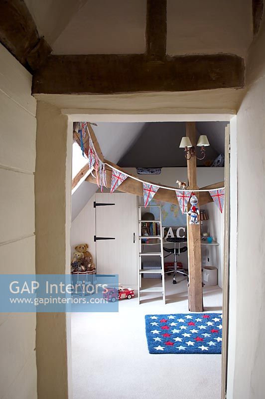 Childs bedroom with bunk beds and bunting