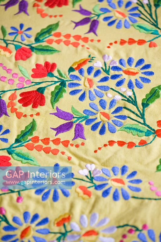 Embroidered cotton bedspread detail
