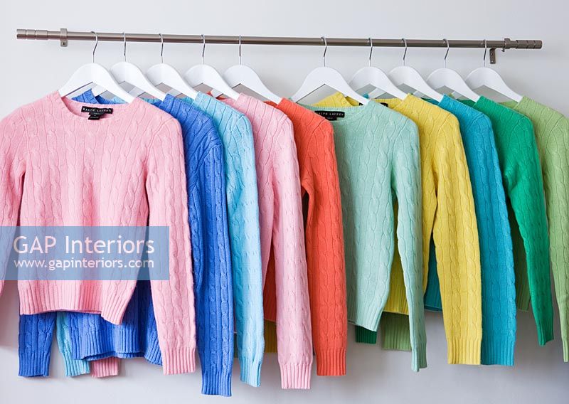 Sweaters for sale on clothes rail