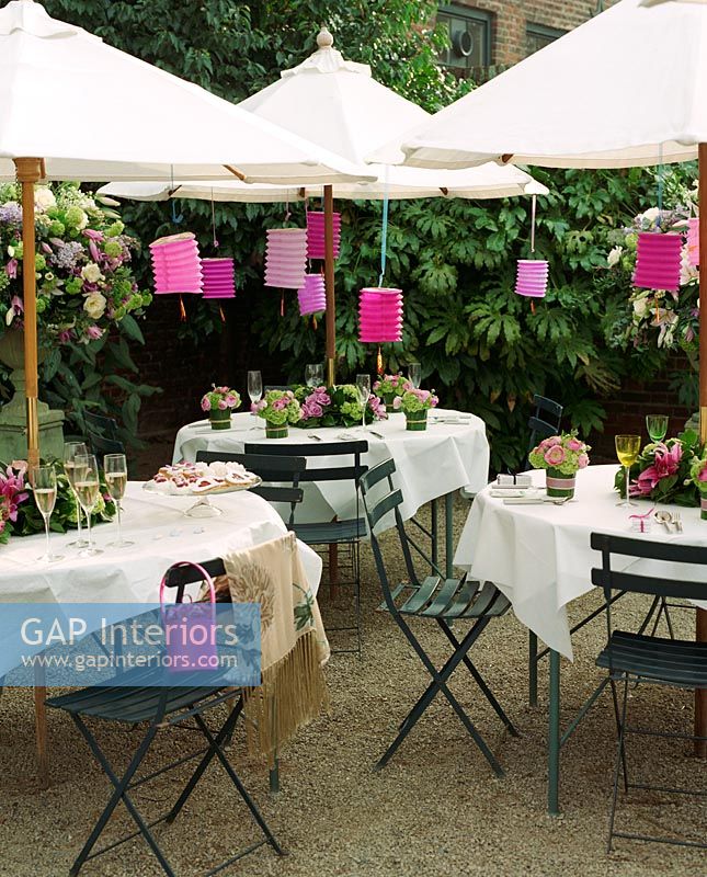 Garden tables set for drinks party