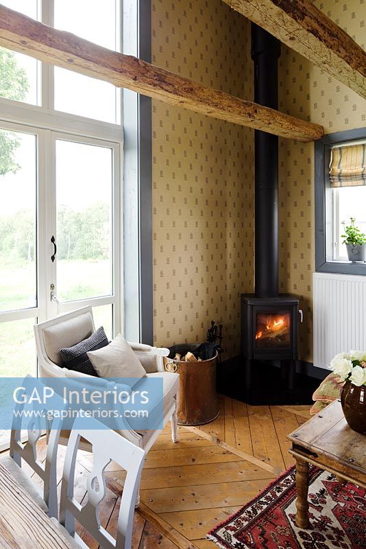 Country living room with wood burning stove