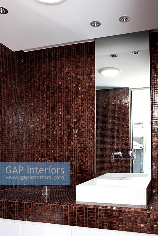 Contemporary bathroom with brown mosaic tiles